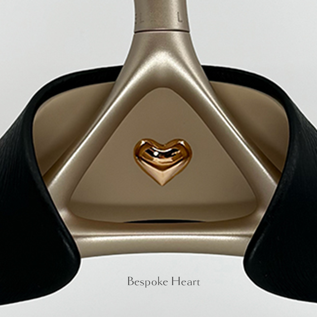 Luxury wedding dress hanger wrapped in onyx Italian leather with a bespoke heart in its center