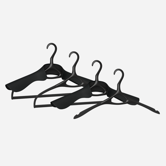 Image of Lou Hansell's L series luxury hangers set, featuring 4 different premium clothes hangers, in Matte Black and Onyx.
