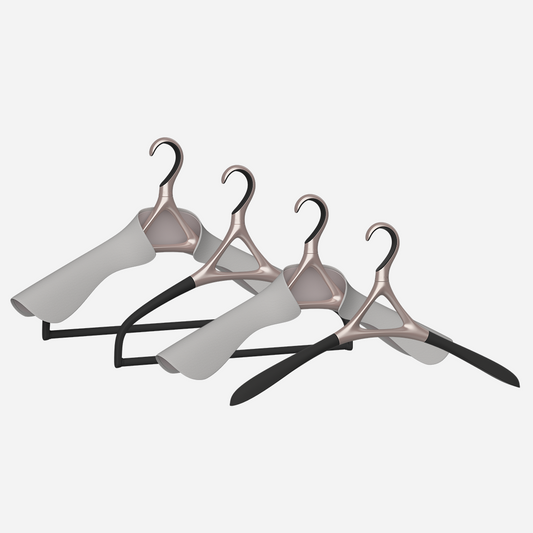 Image of Lou Hansell's H series luxury hangers set, featuring 4 different premium clothes hangers, in Rose Gold and Off-White.