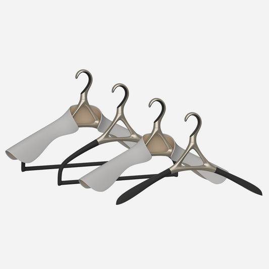 Image of Lou Hansell's H series luxury hangers set, featuring 4 different premium clothes hangers, in Yellow Gold and Off-White.