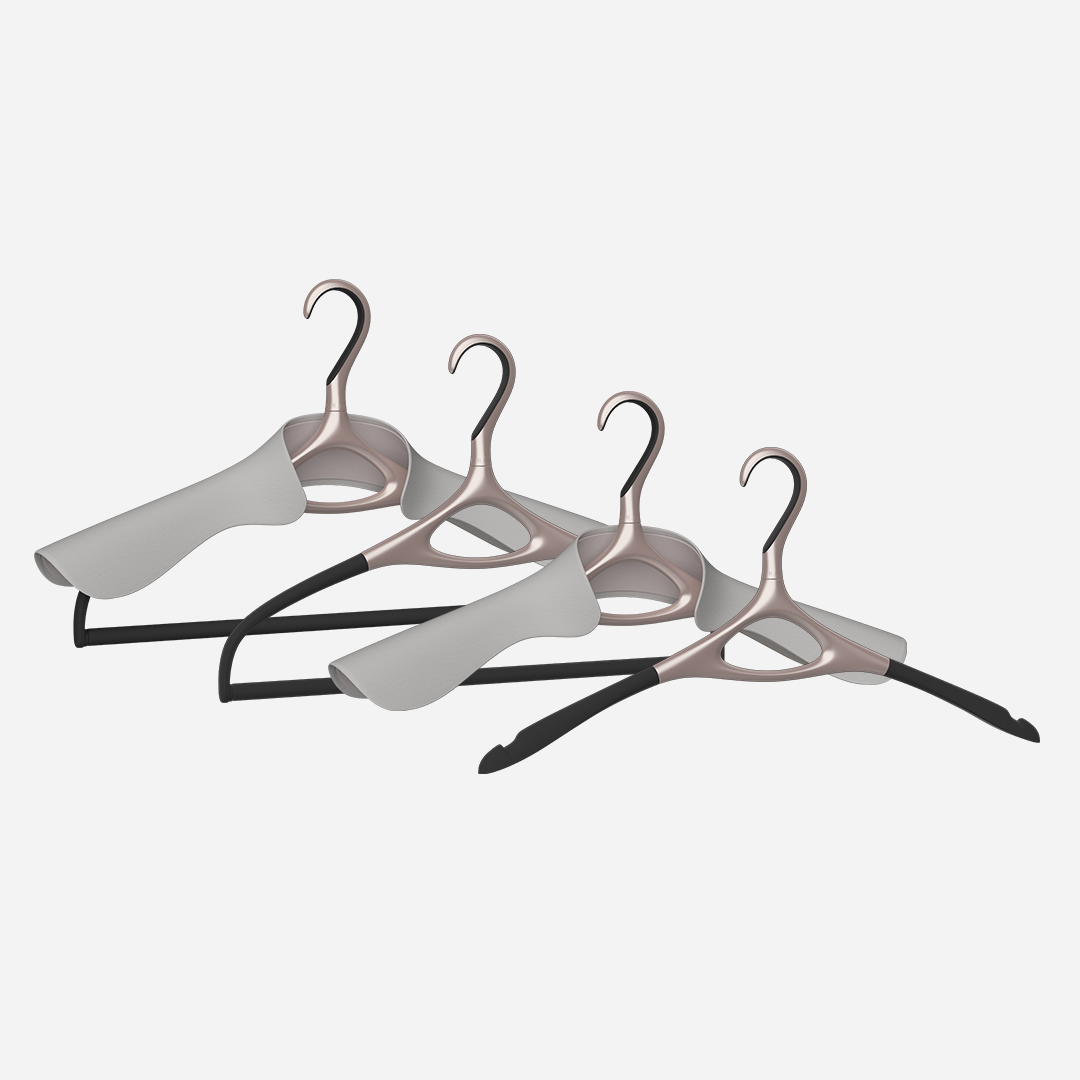 A set of four Lou Hansell L Series luxury hangers in rose gold, including a base hanger, a jacket hanger, a trousers hanger, and a jacket and trousers hanger,
