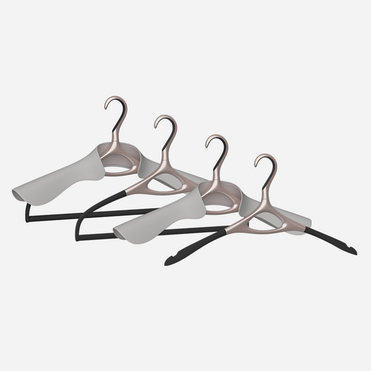 Image of Lou Hansell's L series luxury hangers set, featuring 4 different premium clothes hangers, in Rose Gold and Off-White