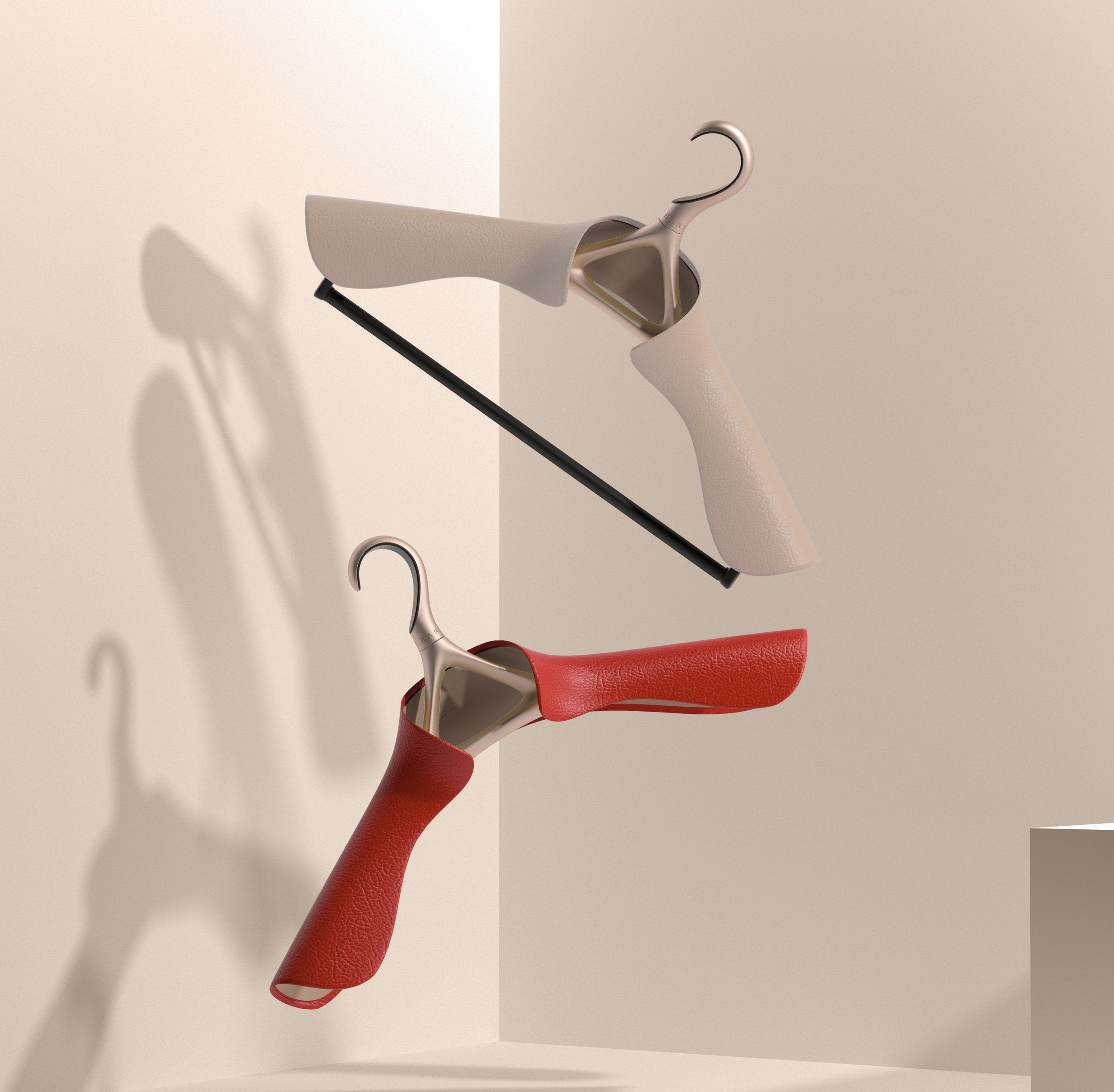 White leather hanger with pants bar and a red leather hanger