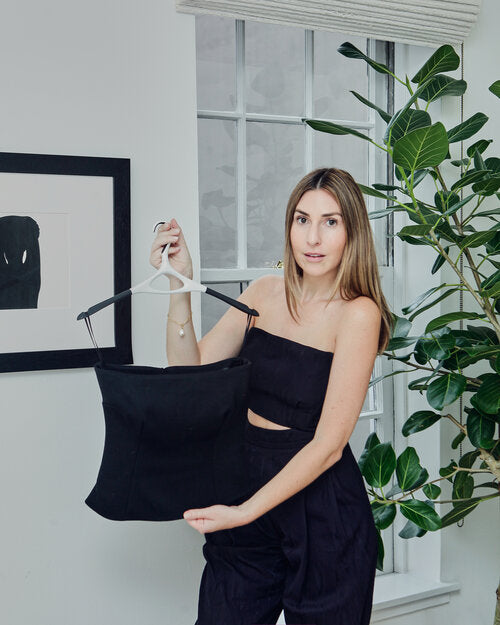 Olivia Stutz, Interior Designer, Olivia Stutz Designs, with a top on a Lou Hansell hanger